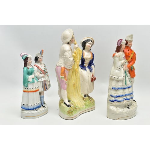 216 - FIVE VICTORIAN STAFFORDSHIRE POTTERY FIGURE GROUPS OF COUPLES, comprising a harvest scene, height 30... 