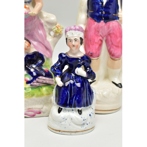 217 - SIX VICTORIAN STAFFORDSHIRE POTTERY FIGURES AND GROUPS, comprising a seated female figure wearing a ... 