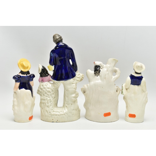 217 - SIX VICTORIAN STAFFORDSHIRE POTTERY FIGURES AND GROUPS, comprising a seated female figure wearing a ... 