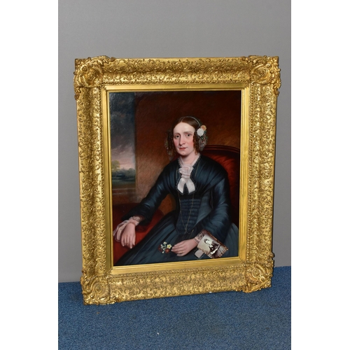 303 - MID 19TH CENTURY ENGLISH SCHOOL, Half-length portrait of a seated lady in an interior, oil on reline... 