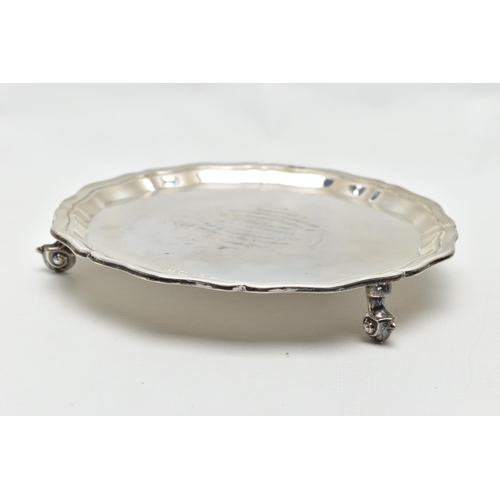 44 - AN ELIZABETH II SILVER WAITER OF CIRCULAR FORM, pie crust border, the centre with presentation inscr... 