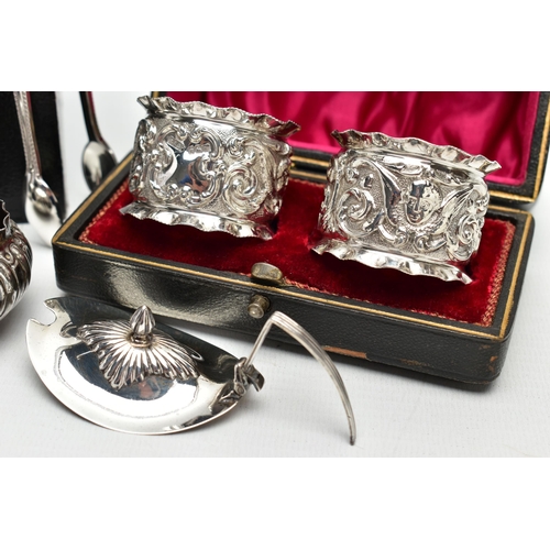 48 - A PARCEL OF LATE VICTORIAN AND 20TH CENTURY SILVER NAPKIN RINGS, SUGAR TONGS AND CRUET ITEMS, compri... 