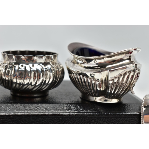 48 - A PARCEL OF LATE VICTORIAN AND 20TH CENTURY SILVER NAPKIN RINGS, SUGAR TONGS AND CRUET ITEMS, compri... 