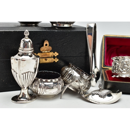 48 - A PARCEL OF LATE VICTORIAN AND 20TH CENTURY SILVER NAPKIN RINGS, SUGAR TONGS AND CRUET ITEMS, compri... 