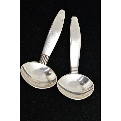 53 - A PAIR OF DANISH STERLING SILVER CADDY SPOONS BY F. HINGELBERG, bears import marks for R C P Ltd, Lo... 