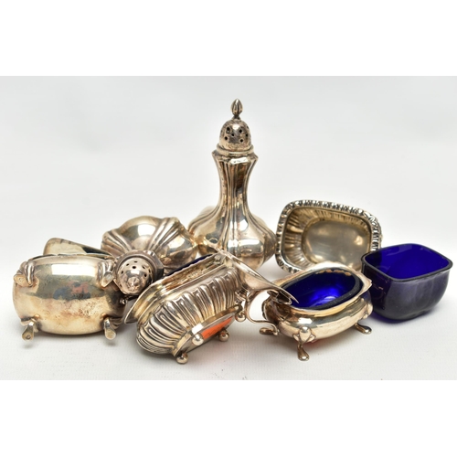 101 - AN ASSORTMENT OF CONDIMENT SETS, to include a pair of Edwardian silver pepperettes, hallmark rubbed ... 