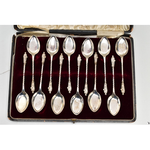 59 - A CASED SET OF TWELVE EDWARDIAN SILVER ICE CREAM SPOONS, Elizabethan male figure finial on a spiral ... 