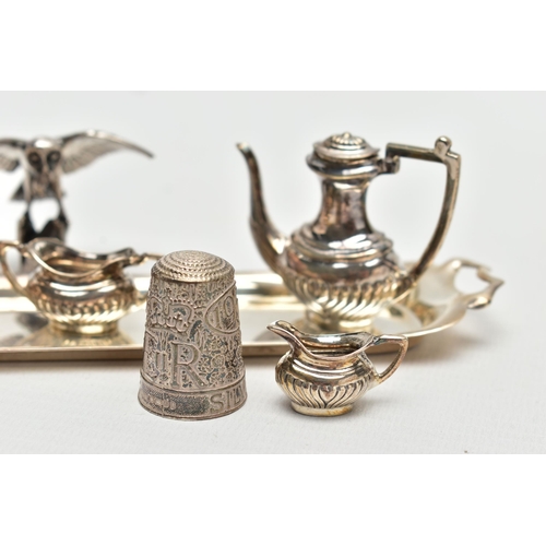 60 - AN ELIZABETH II MINIATURE SILVER FOUR PIECE TEA AND COFFEE SET ON TRAY, makers A Marston & Co, Birmi... 