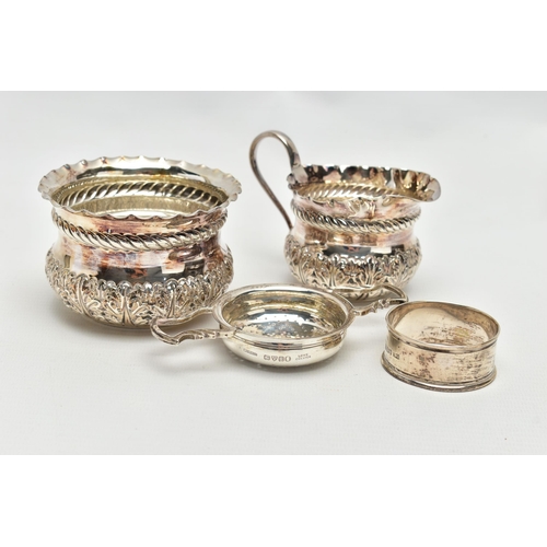 61 - A LATE VICTORIAN SILVER CREAM JUG AND SUGAR BOWL OF CIRCULAR FORM, crimped rims above a rope twist r... 