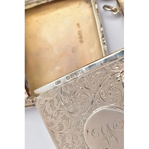 63 - A LATE VICTORIAN SILVER CARD CASE, hinged top, foliate engraved decoration back and front, circular ... 