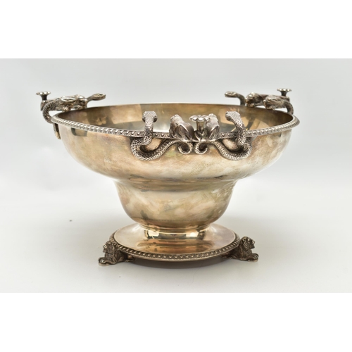 65 - A GEORGE V SILVER PEDESTAL BOWL, with three cast handles, each formed of two serpents and two lion d... 