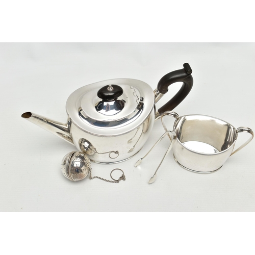 70 - A GEORGE V SILVER TWO PIECE TEA SET OF OVAL FORM, comprising teapot and sugar bowl with reeded rims,... 