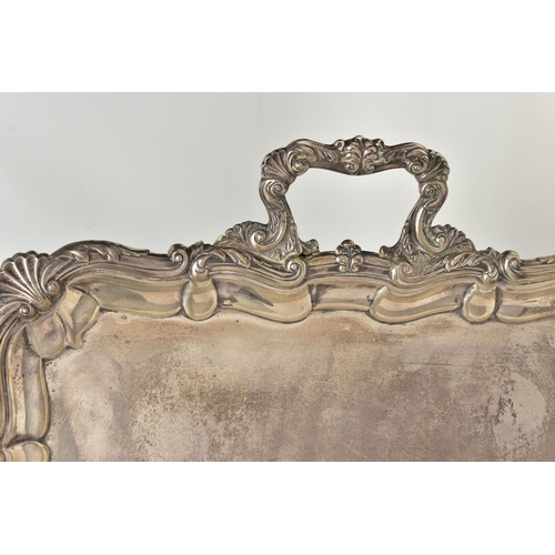 76 - AN EDWARDIAN SILVER TWIN HANDLED TRAY OF RECTANGULAR FORM WITH PIE CRUST AND SHELL RIMS, plain surfa... 