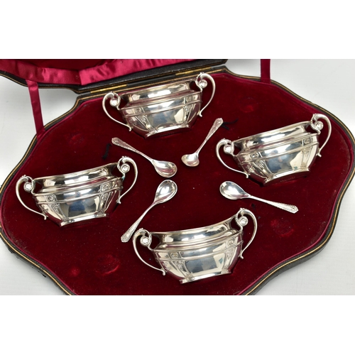 81 - A CASED SET OF FOUR EDWARDIAN GOLDSMITHS & SILVERSMITHS CO LTD SILVER SALTS, of twin handled oval fo... 