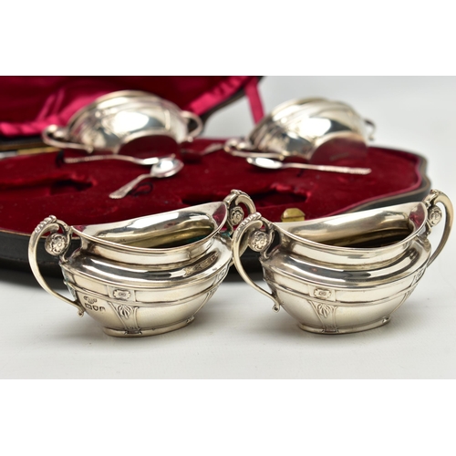 81 - A CASED SET OF FOUR EDWARDIAN GOLDSMITHS & SILVERSMITHS CO LTD SILVER SALTS, of twin handled oval fo... 