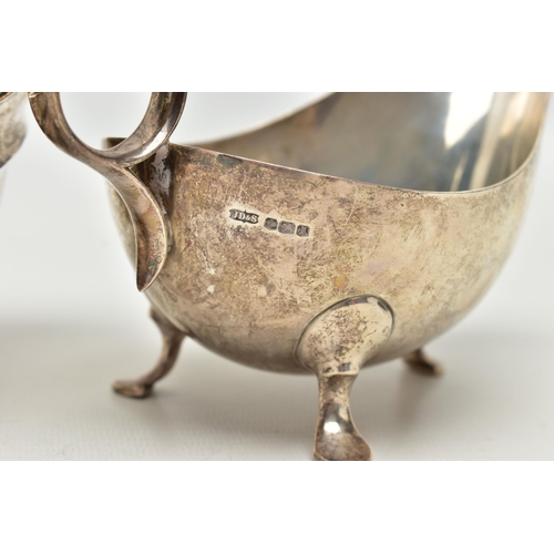 82 - THREE 20TH CENTURY OVAL SILVER SAUCE BOATS OF VARYING DESIGNS, one on an oval foot, stamped 987L to ... 