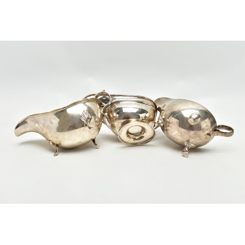 82 - THREE 20TH CENTURY OVAL SILVER SAUCE BOATS OF VARYING DESIGNS, one on an oval foot, stamped 987L to ... 