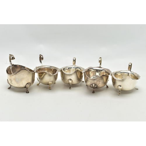 83 - FIVE 20TH CENTURY SILVER SAUCE BOATS OF VARYING DESIGNS, all on three cabriole legs, one with gadroo... 