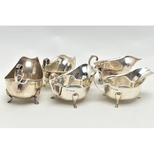 83 - FIVE 20TH CENTURY SILVER SAUCE BOATS OF VARYING DESIGNS, all on three cabriole legs, one with gadroo... 