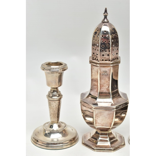 87 - AN ELIZABETH II SUGAR CASTER, A PAIR OF CANDLESTICKS AND AN EBONY BOX, the octagonal silver sugar ca... 