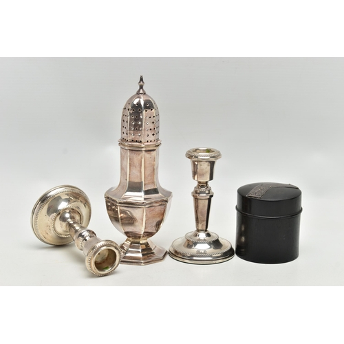 87 - AN ELIZABETH II SUGAR CASTER, A PAIR OF CANDLESTICKS AND AN EBONY BOX, the octagonal silver sugar ca... 