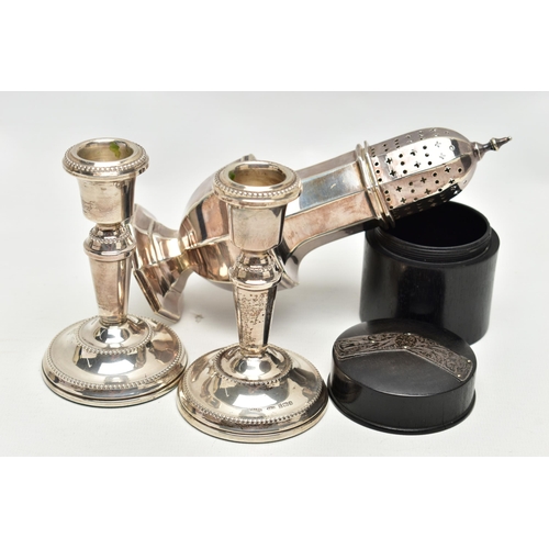 87 - AN ELIZABETH II SUGAR CASTER, A PAIR OF CANDLESTICKS AND AN EBONY BOX, the octagonal silver sugar ca... 