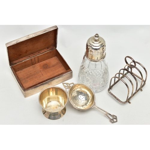 94 - A SMALL PARCEL OF 20TH CENTURY SILVER, comprising a George VI tea strainer with conical stand, maker... 