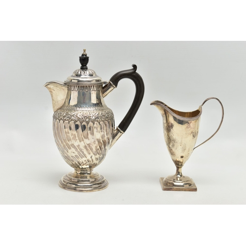 95 - A LATE VICTORIAN SILVER HOT WATER JUG AND A LATE VICTORIAN GEORGIAN STYLE HELMET SHAPED CREAM JUG, t... 