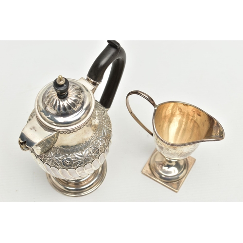 95 - A LATE VICTORIAN SILVER HOT WATER JUG AND A LATE VICTORIAN GEORGIAN STYLE HELMET SHAPED CREAM JUG, t... 