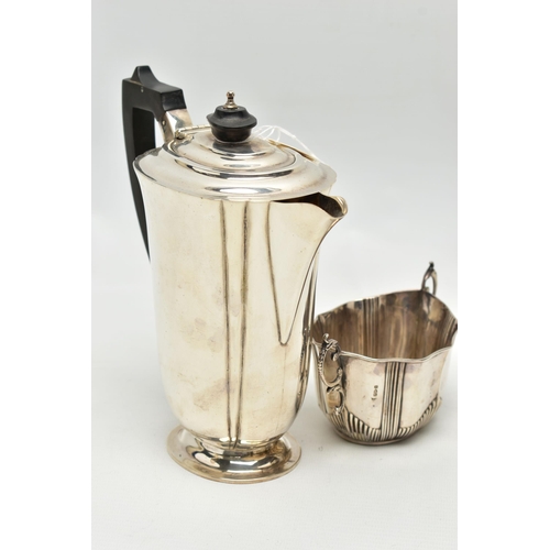 96 - A GEORGE V SILVER HOT WATER JUG AND A LATE VICTORIAN TWIN HANDLED SUGAR BOWL, the hot water jug of s... 