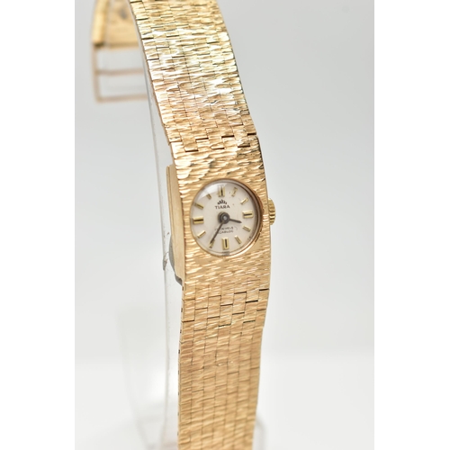 13 - A LADY'S 9CT GOLD 'TIARA' WRISTWATCH, manual wind, round silver dial signed 'Tiara, 17 jewels Incabl... 