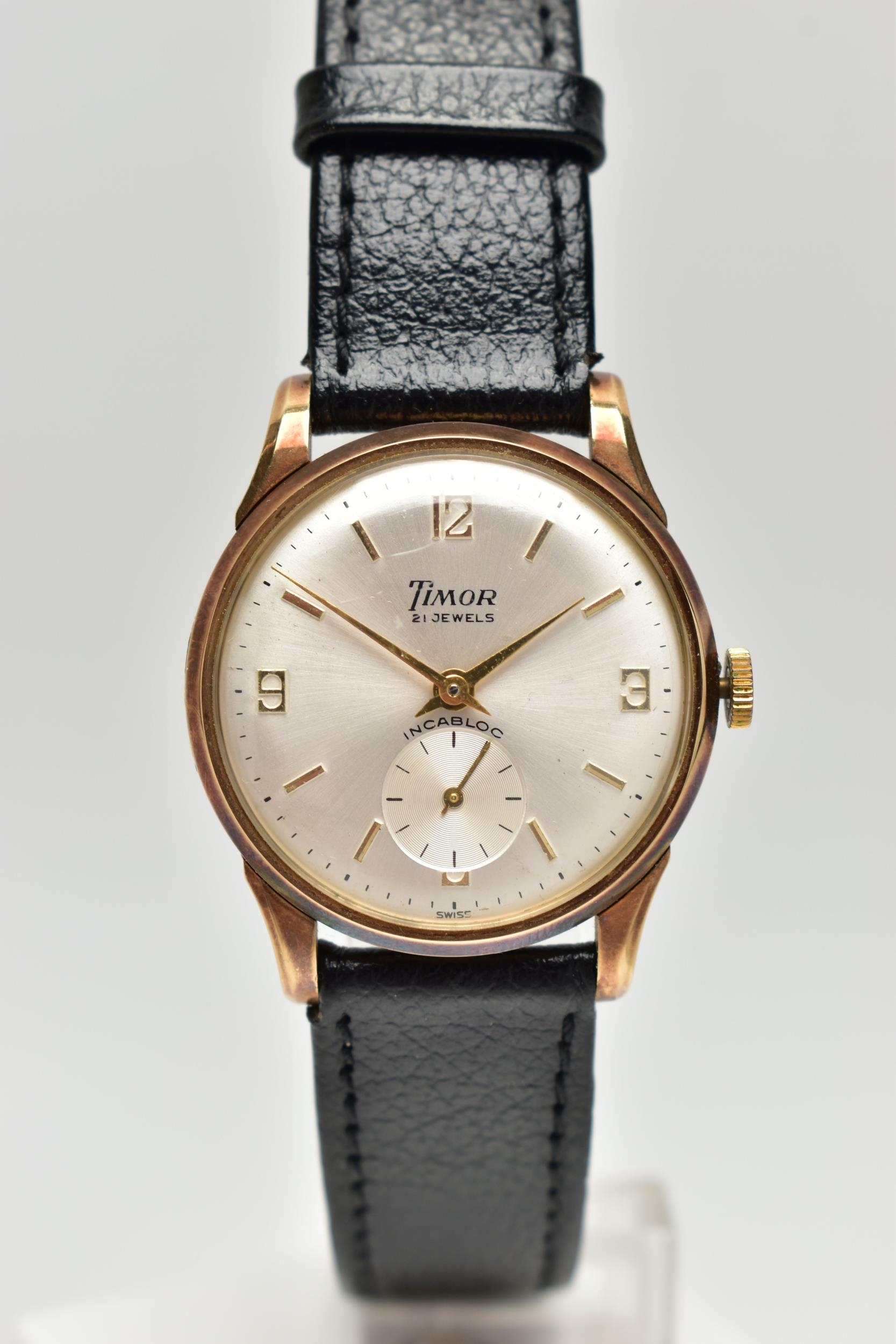 A GENTS 9CT GOLD 'TIMOR' WRISTWATCH, manual wind, round silver