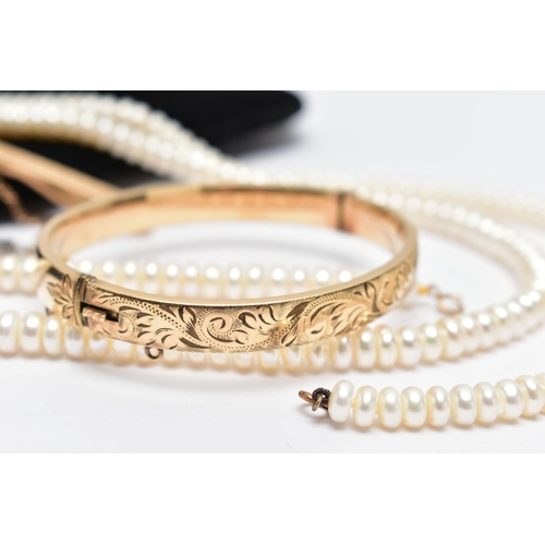 48 - AN ASSORTMENT OF YELLOW METAL JEWELLERY,  to include a pair of cubic zirconia and 9ct gold stud earr... 