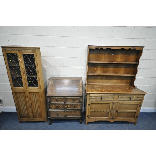 1215 - AN OAK DRESSER, with two drawers, width 126cm x depth 48cm x height 179cm (condition:-water stains) ... 