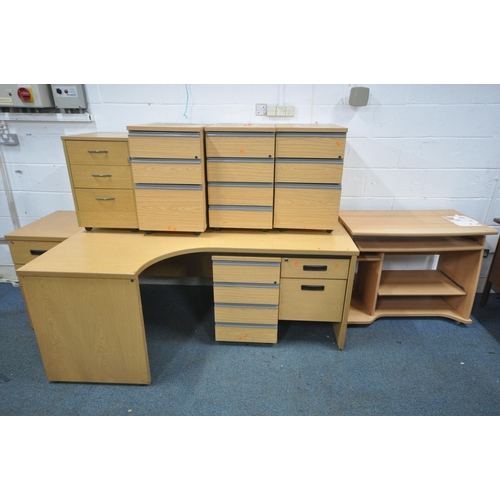 1218 - A LARGE SELECTION OF LIGHT WOOD OFFICE FURNITURE, to include six various desks and seven various und... 