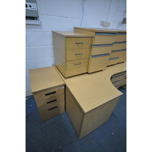 1218 - A LARGE SELECTION OF LIGHT WOOD OFFICE FURNITURE, to include six various desks and seven various und... 