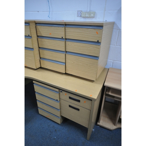 1218 - A LARGE SELECTION OF LIGHT WOOD OFFICE FURNITURE, to include six various desks and seven various und... 