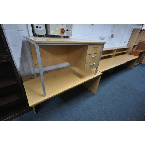 1218 - A LARGE SELECTION OF LIGHT WOOD OFFICE FURNITURE, to include six various desks and seven various und... 