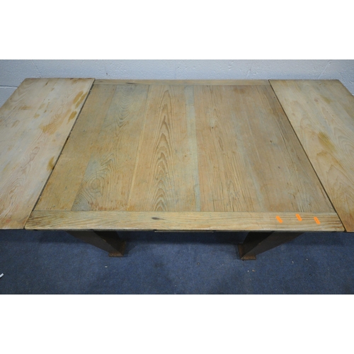 1277 - AN ARTS AND CRAFTS PINE DRAW LEAF DINING TABLE, on square tapered legs, extended length 193cm x clos... 