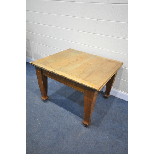 1277 - AN ARTS AND CRAFTS PINE DRAW LEAF DINING TABLE, on square tapered legs, extended length 193cm x clos... 