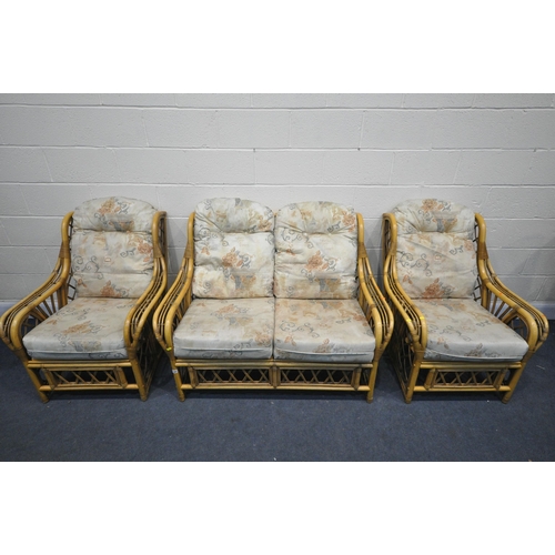 1281 - A WICKER THREE PIECE CONSERVATORY SUITE, comprising a two seater sofa, length 130cm, and two armchai... 