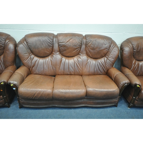 1282 - A BROWN LEATHERETTE THREE PIECE SUITE, comprising a three seater sofa, and two armchairs (condition ... 