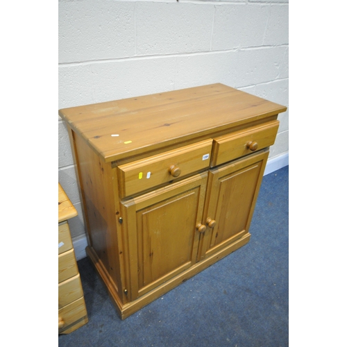 1284 - A MODERN PINE CABINET, with two drawers, and panelled cupboard doors, width 92cm x depth 45cm x heig... 