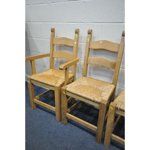 1285 - A SET OF SIX SOLID BEECH DINING CHAIRS, with drop in rush seats, including two carvers (condition - ... 