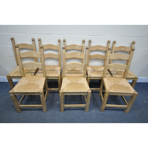 1286 - A SET OF EIGHT SOLID BEECH DINING CHAIRS, with drop in rush seats (condition:-general wear)