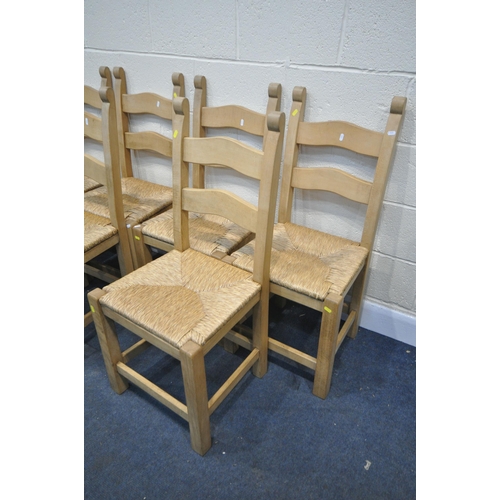 1286 - A SET OF EIGHT SOLID BEECH DINING CHAIRS, with drop in rush seats (condition:-general wear)