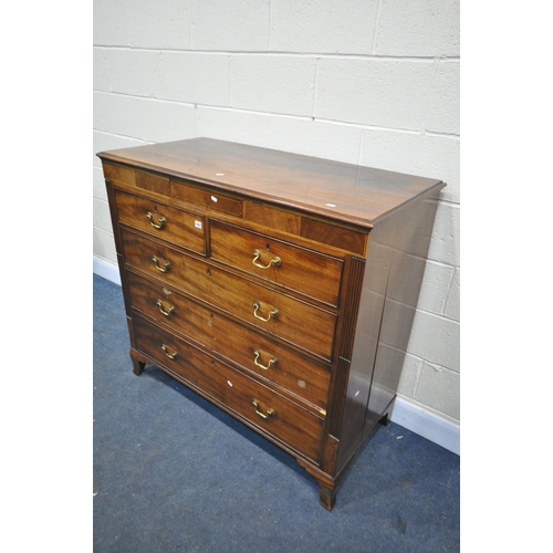 1287 - A GEORGIAN MAHOGANY CHEST OF TWO SHORT AND THREE LONG DRAWERS, with a secret single drawer, brass sw... 