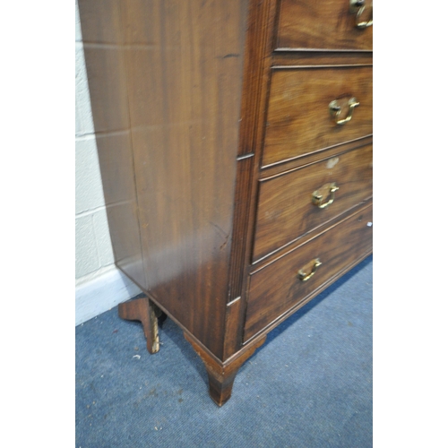 1287 - A GEORGIAN MAHOGANY CHEST OF TWO SHORT AND THREE LONG DRAWERS, with a secret single drawer, brass sw... 