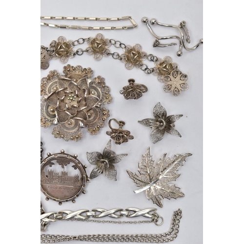 11 - AN ASSORTMENT OF SILVER AND WHITE METAL JEWELLERY, to include a silver albert chain, each link is st... 