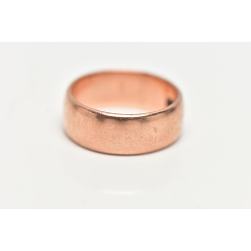 15 - A WIDE ROSE METAL BAND RING, polished band, approximate band width 6.6mm, ring size leading edge J, ... 